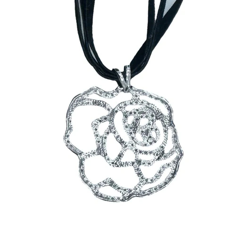 STERLING SILVER OPEN FLOWER PENDANT W MICRO PAVE STONES ON BLACK SUEDE NECKLACE